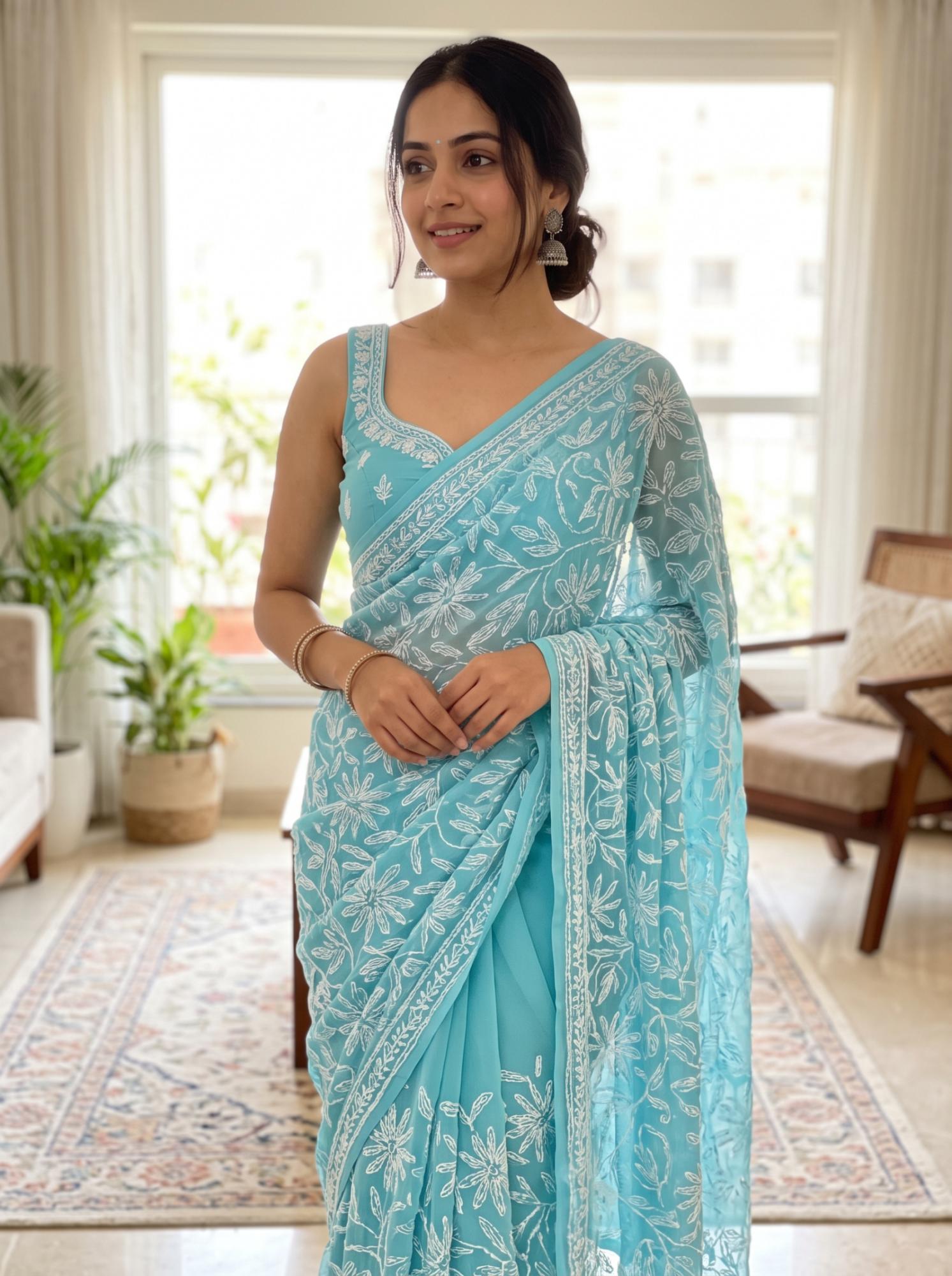 Elegant Sky Blue Tapchi Work Saree